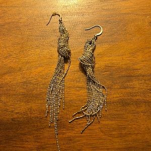 Gold and silver dangling earrings